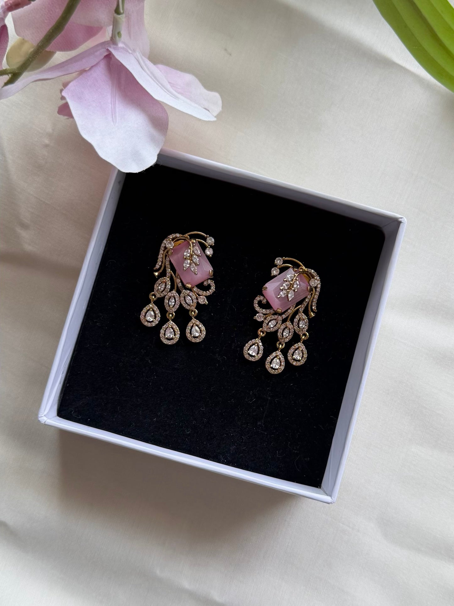 AD studded earrings
