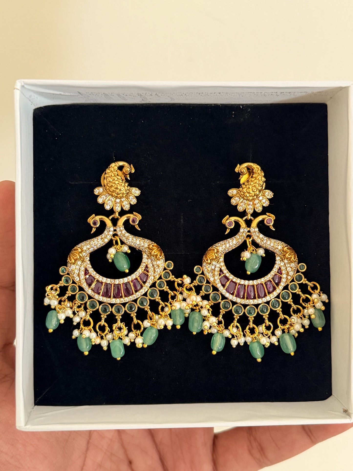 Elegant Peacock Kemp Stone Chaandbali Earrings with Pearl & Green Beads