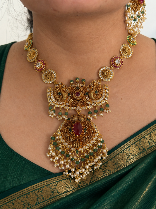 Nakshi Peacock Long Necklace Set with Ruby Centre Pendant, Pearl Drops and Earrings