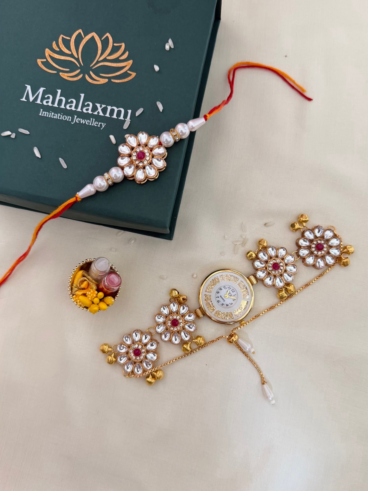 White Kundan Pearl Rakhi & Gold Dial Kundan Bracelet Watch Combo