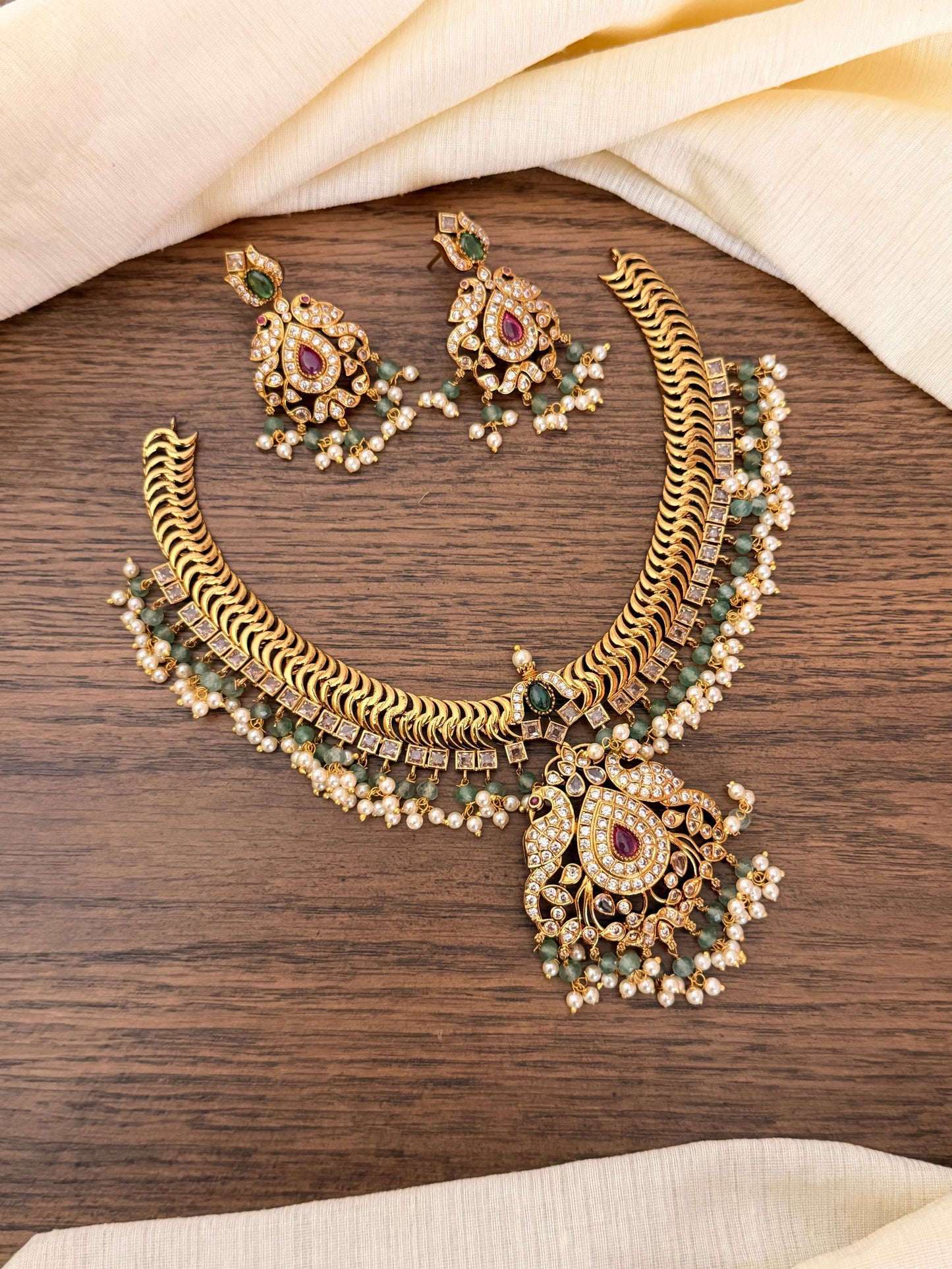 Traditional Jalebi Design Necklace Set with Ruby & Emerald Stones
