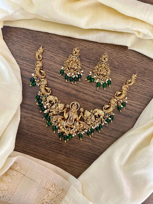 3D Grand Lakshmi Devi Antique Gold Necklace Set with Temple Design & Green Beads