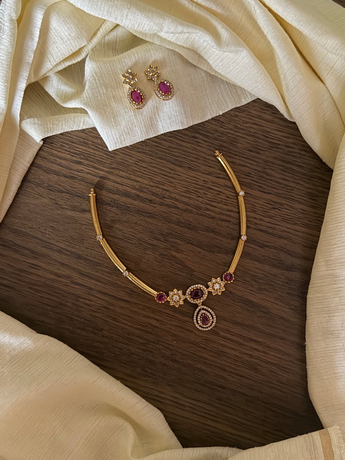 Delicate Gold Finish Floral Kanti Choker Set with Teardrop Pendant
