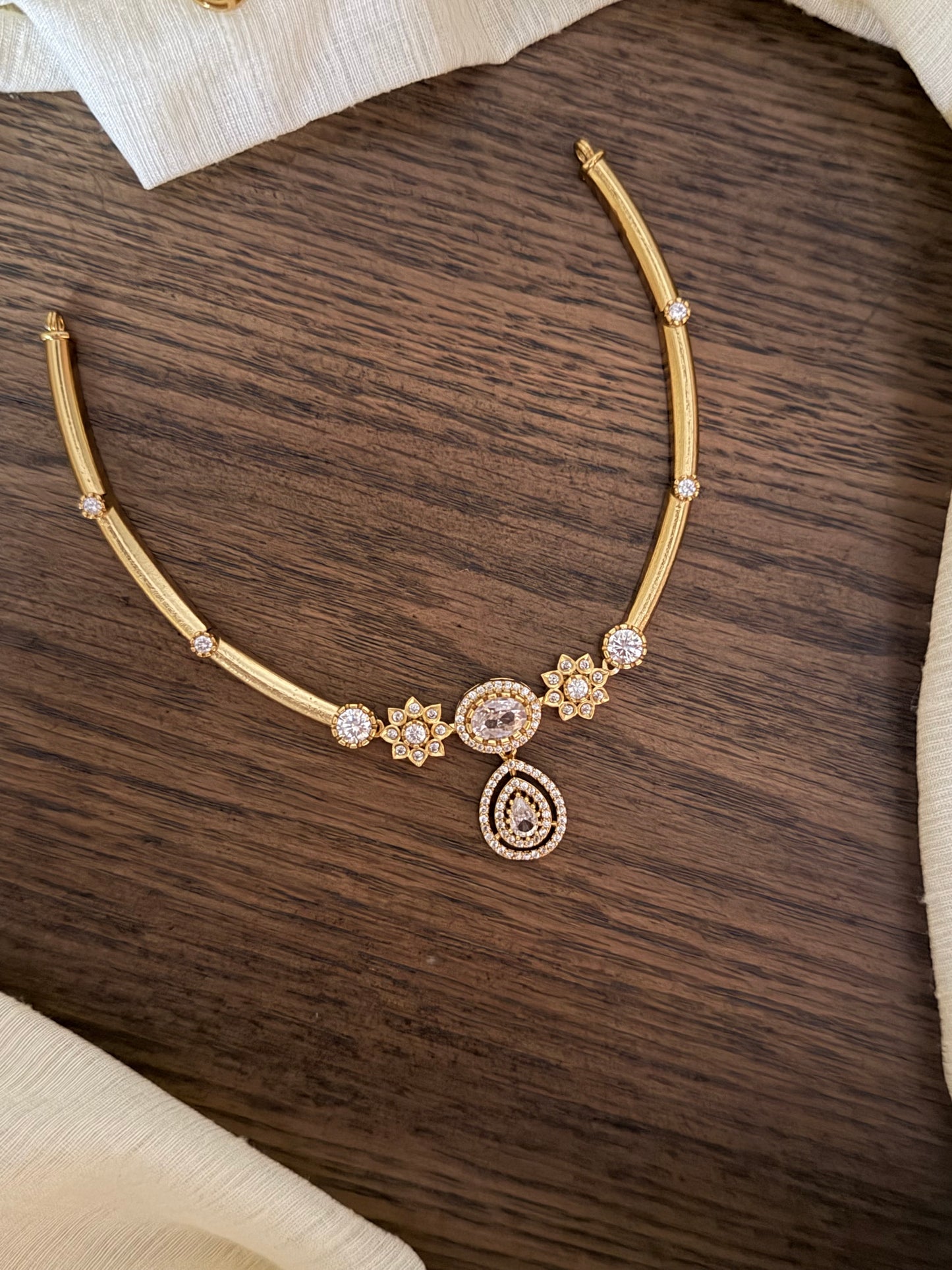 Delicate Gold Finish Floral Kanti Choker Set with Teardrop Pendant