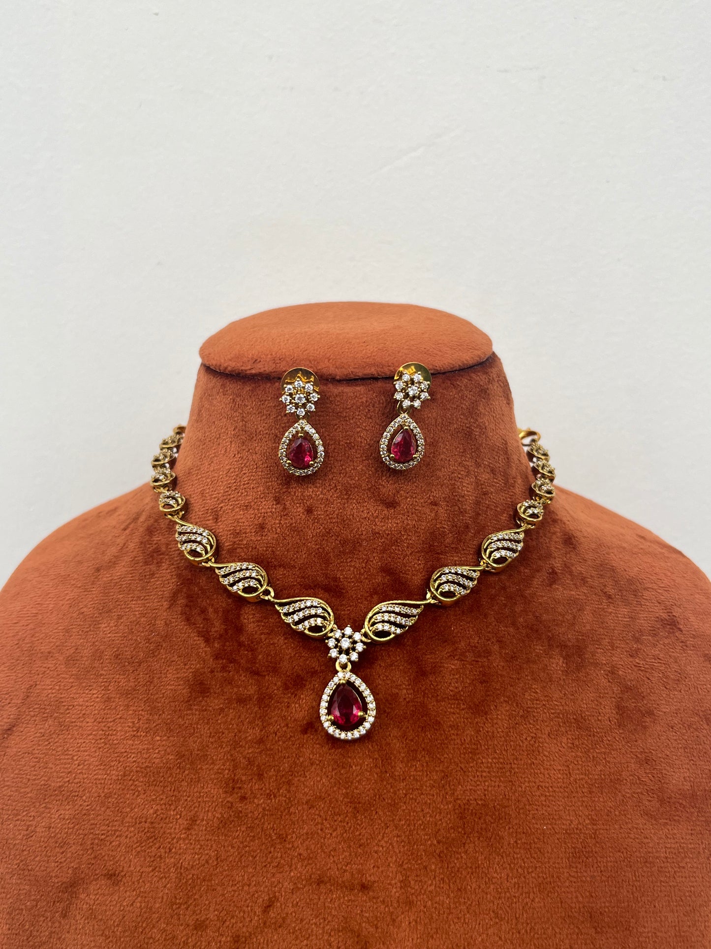 Sleek AD Necklace with Red Center – Modern Wedding Guest Set with Earrings