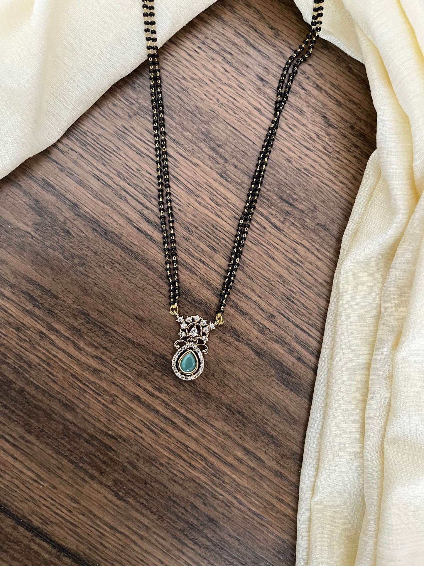 Minimal AD Studded Medium Length Mangalsutra – Green & Mint Variants