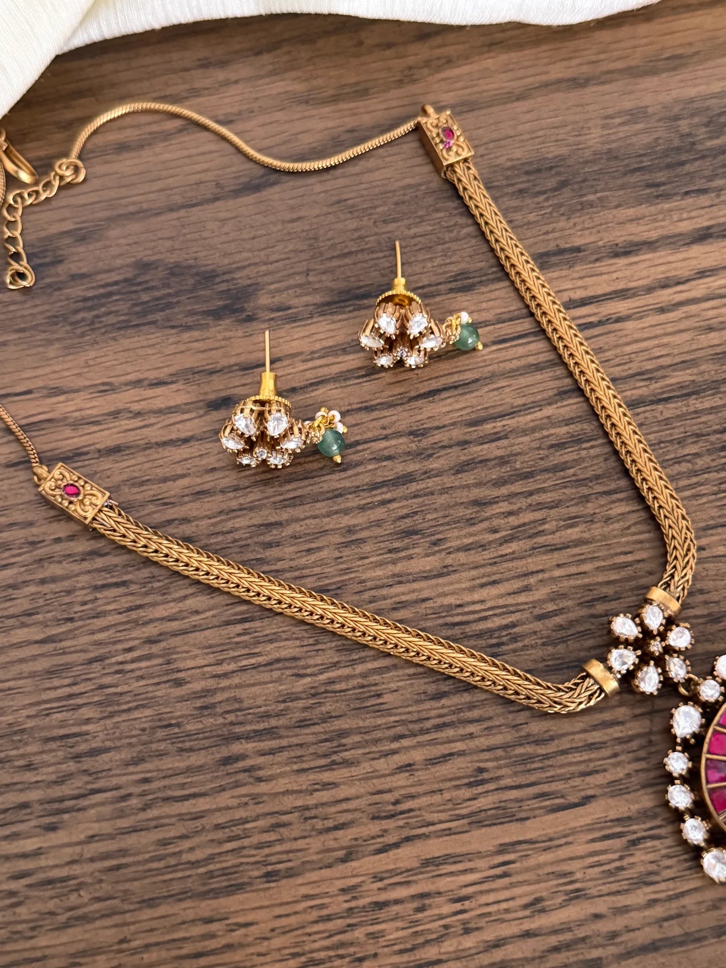 Emerald Jadau Kundan Oval Pendant Necklace Set