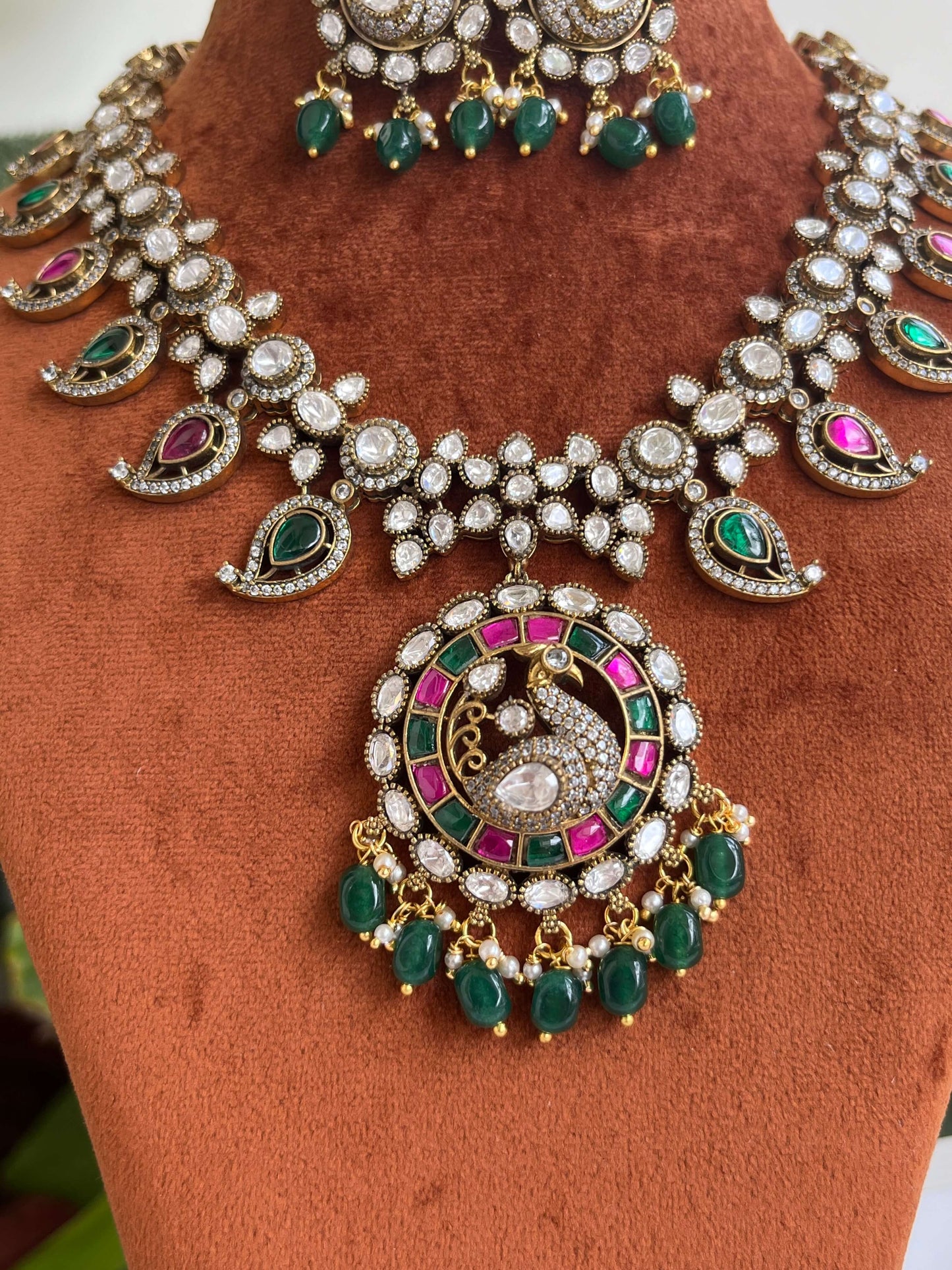 Jadau Kundan Peacock Necklace Set with Green & Ruby Accents | Traditional Bridal Jewelry