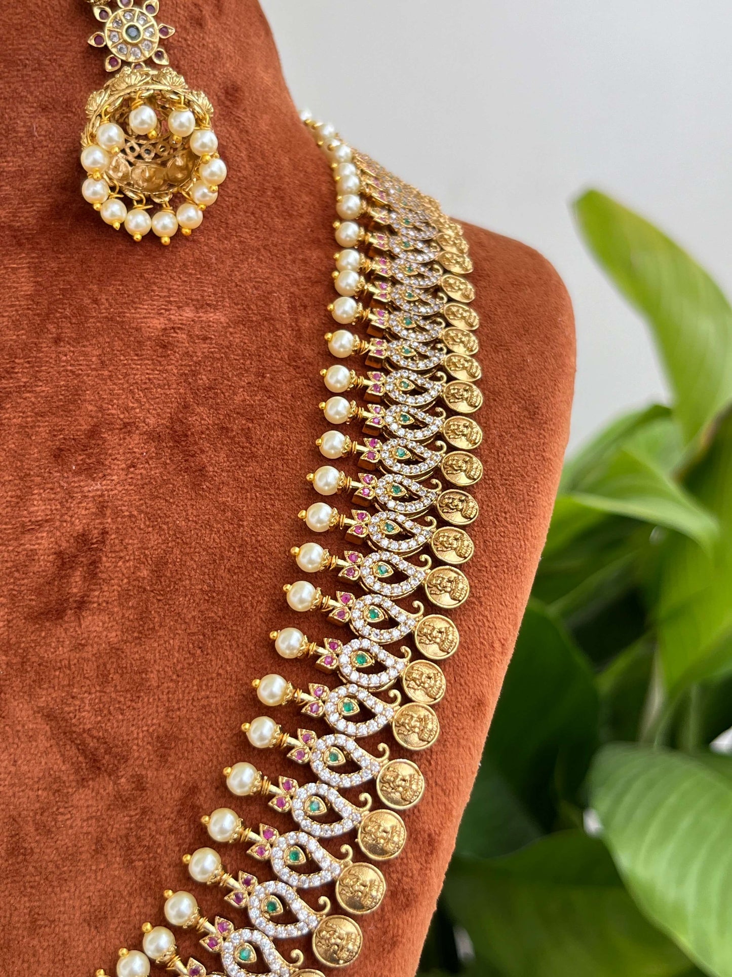 Nakshi Polish Mango Leaf Lakshmi Devi Coin Haram cum Vaddanam with Pearls & Jhumkas