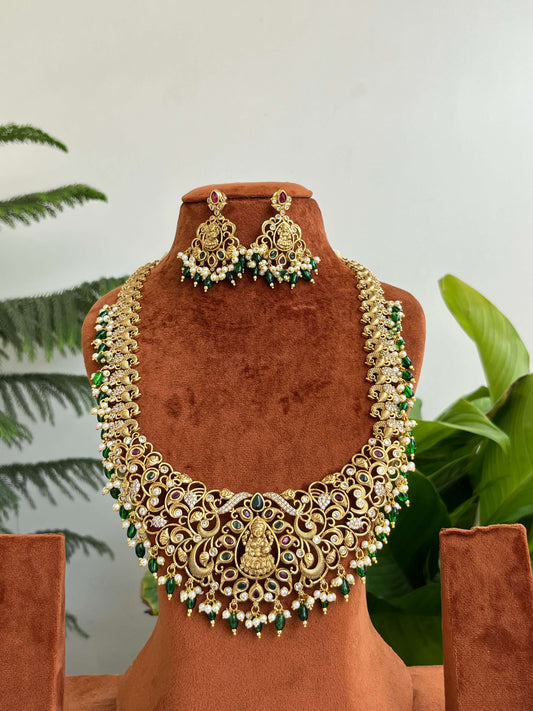 Bridal Temple Long Haram with Lakshmi Devi & Peacock Design | Antique Gold Finish