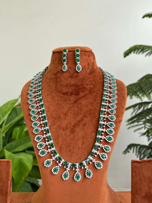 Silver CZ Studded Long Haram with Emerald Motifs & Earrings | Bridal Jewelry Set