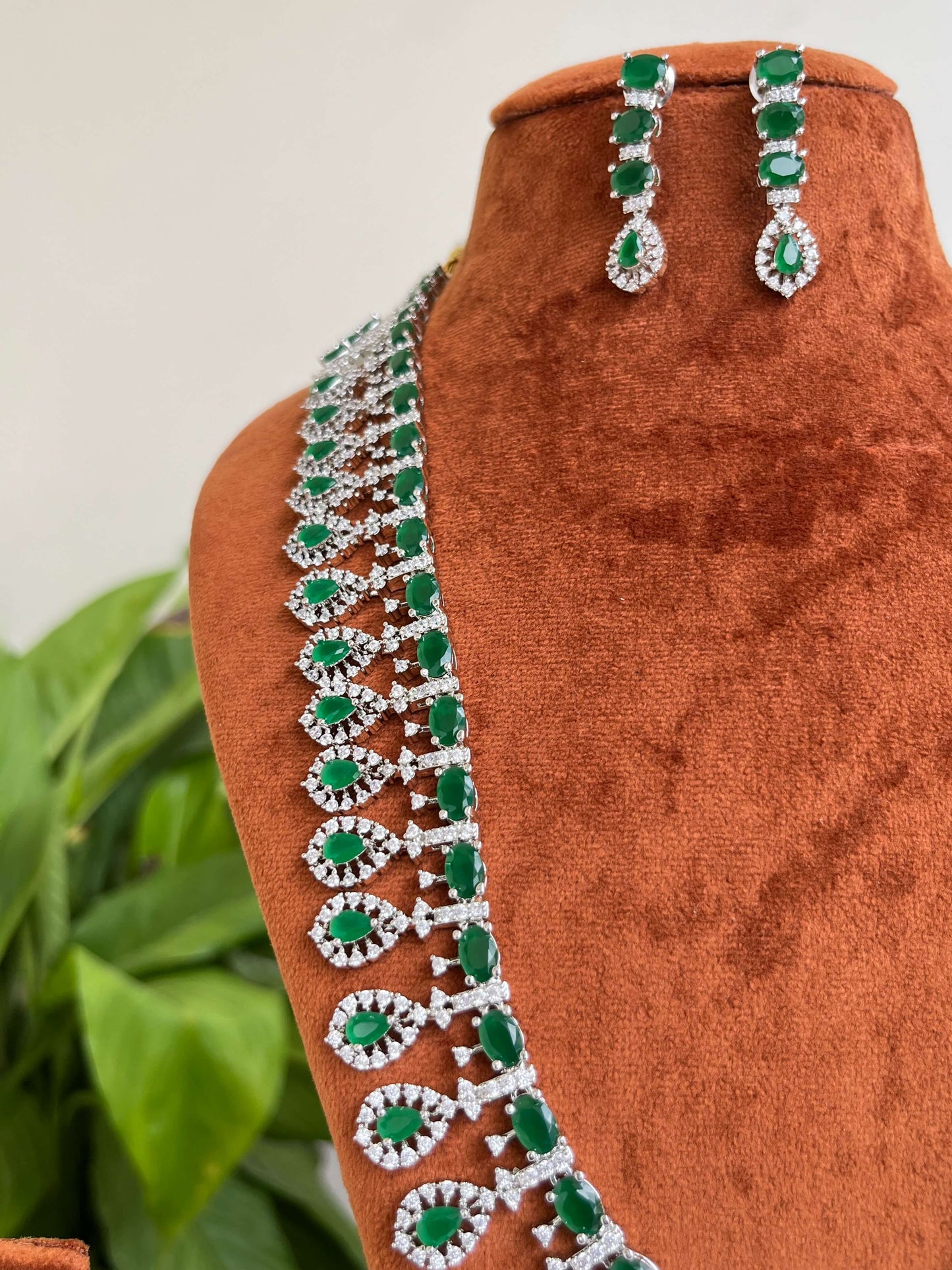 Silver CZ Studded Long Haram with Emerald Motifs & Earrings | Bridal Jewelry Set