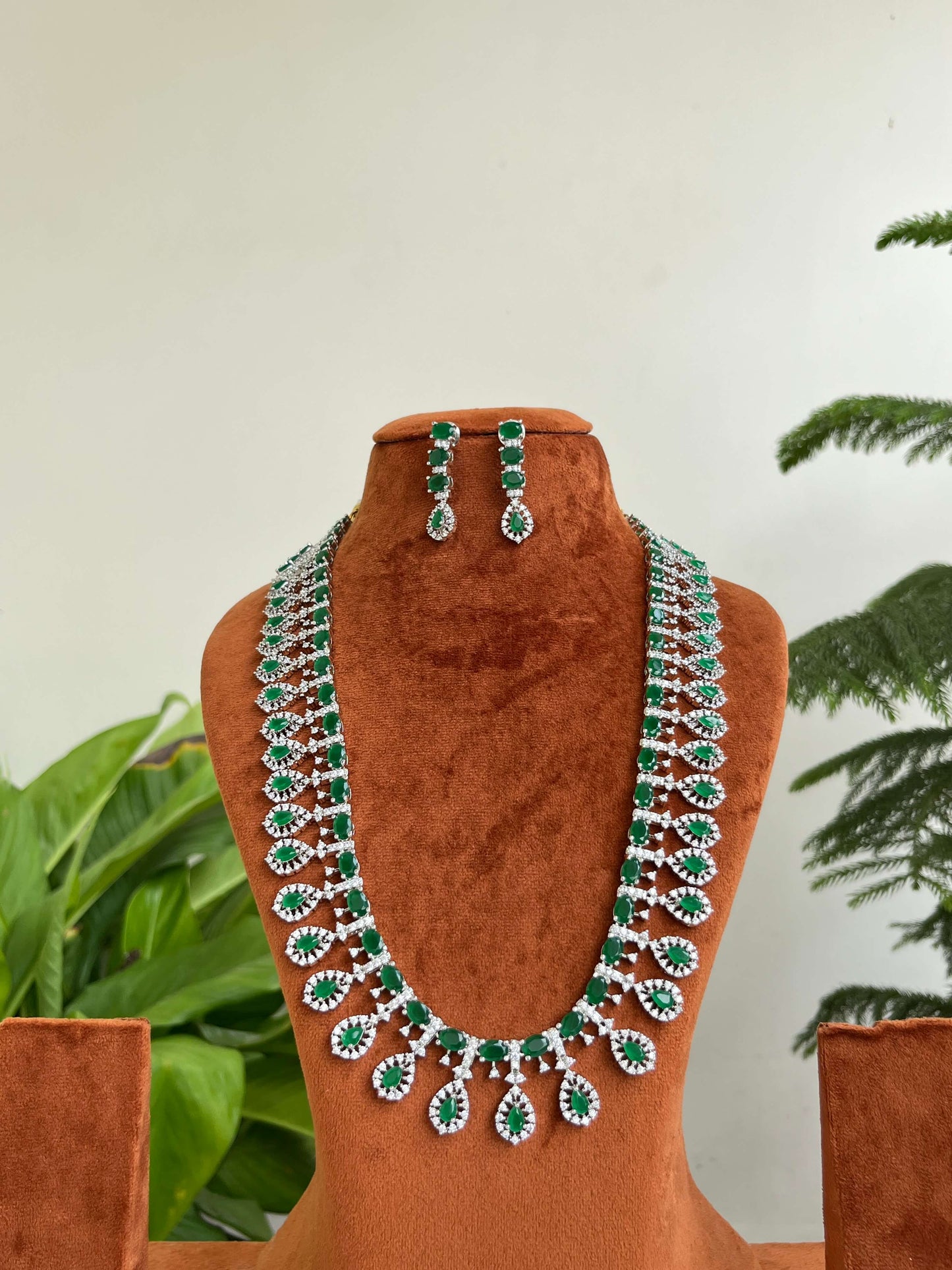 Silver CZ Studded Long Haram with Emerald Motifs & Earrings | Bridal Jewelry Set