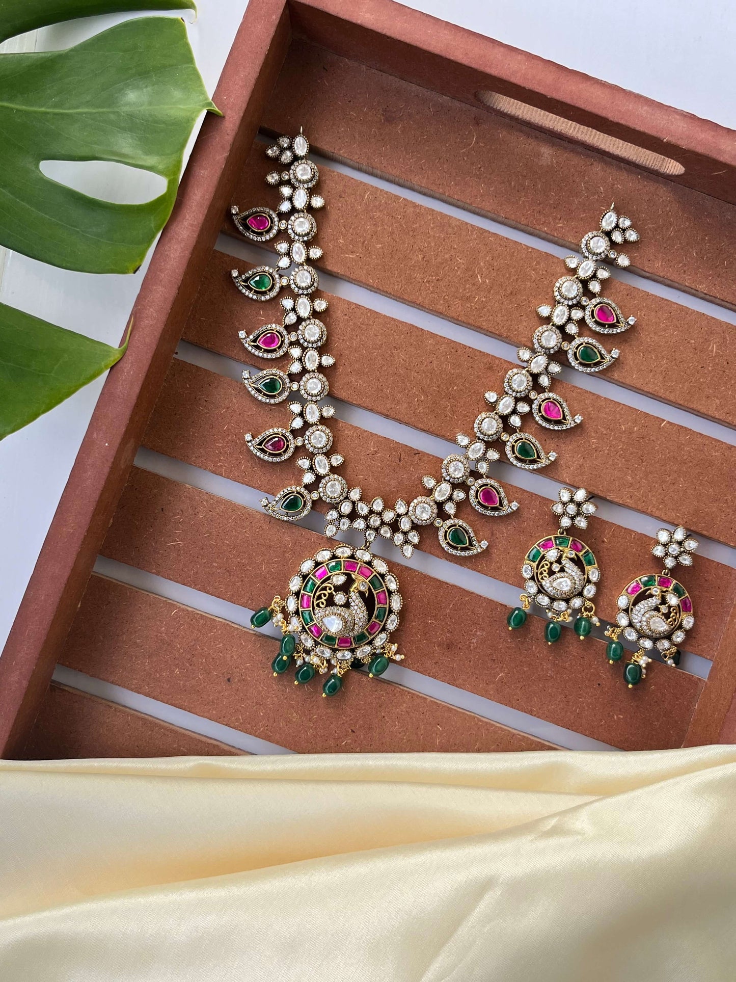 Jadau Kundan Peacock Necklace Set with Green & Ruby Accents | Traditional Bridal Jewelry