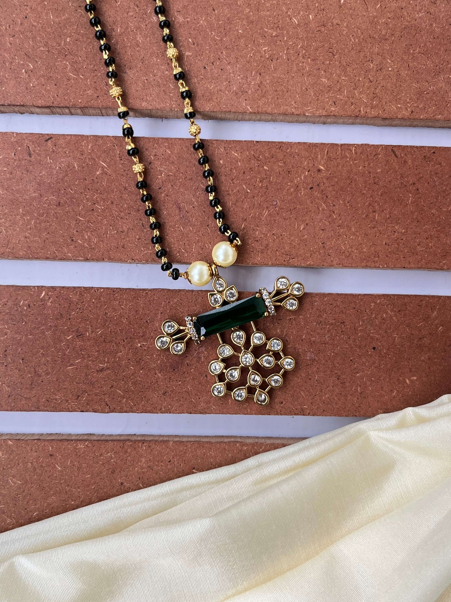 Studded Design Medium Length Mangalsutra with Green Stone Pendant