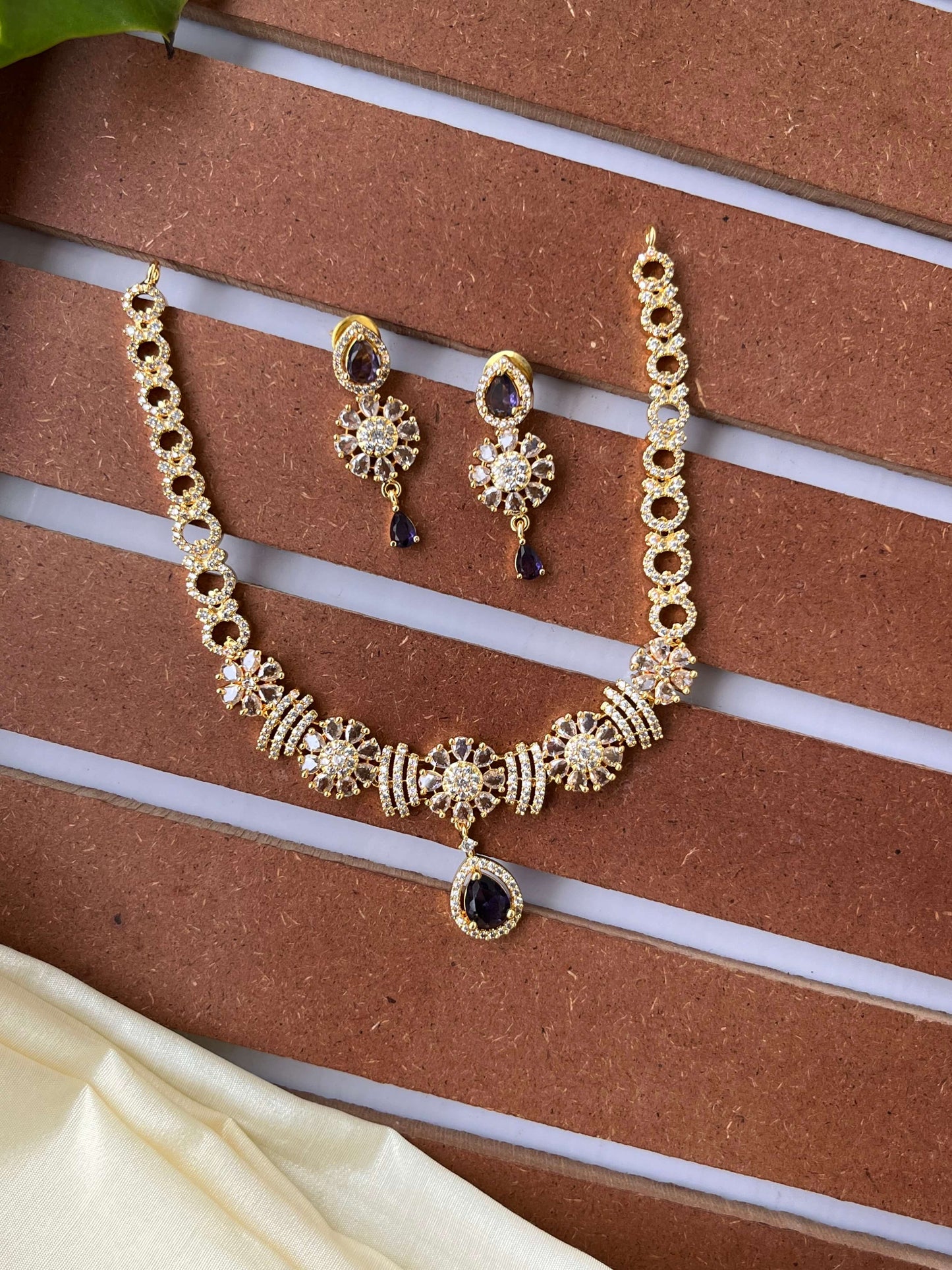 Golden Polish Floral Motif Necklace Set – Available in Purple & Emerald Green Variants