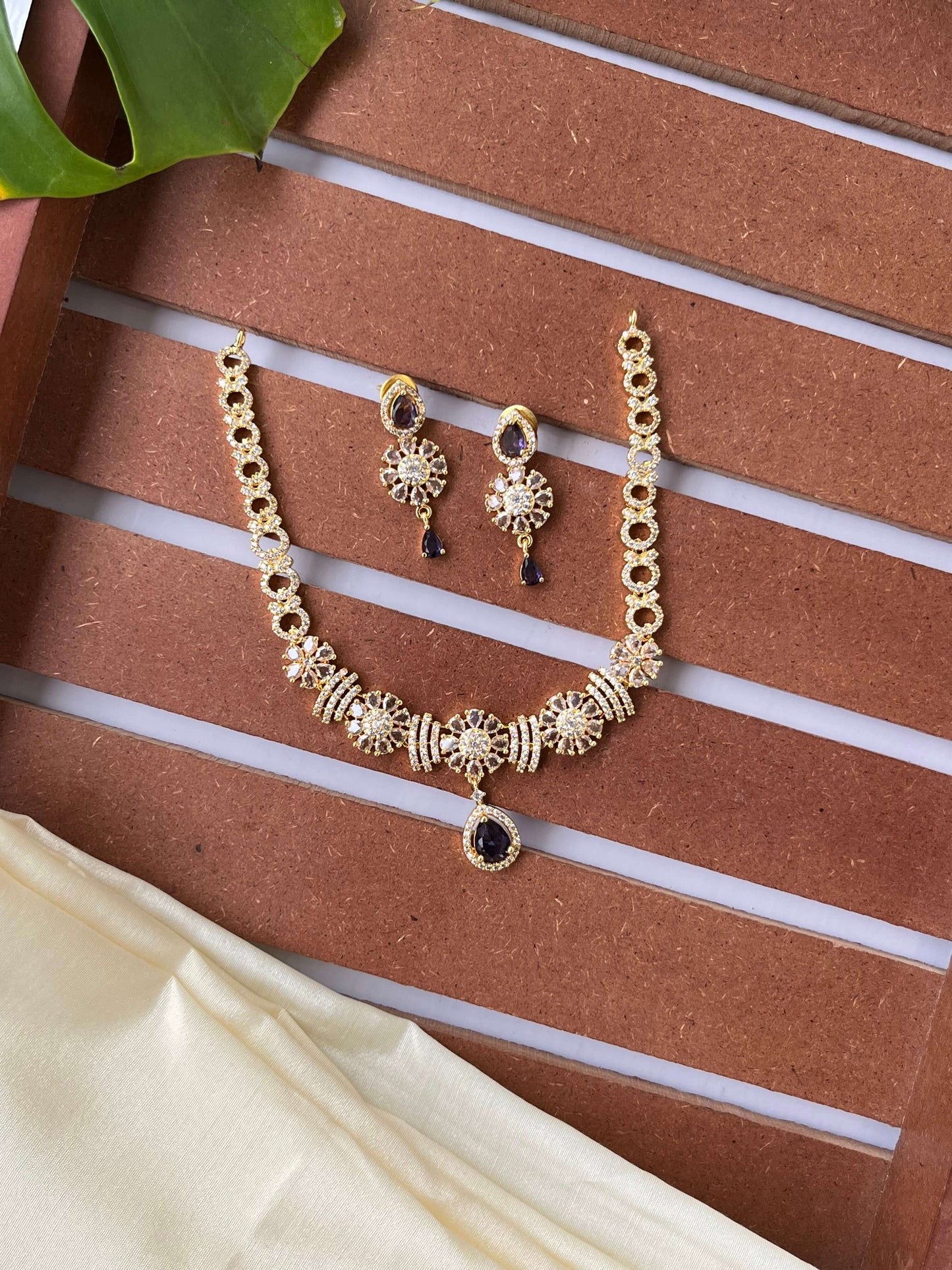 Golden Polish Floral Motif Necklace Set – Available in Purple & Emerald Green Variants