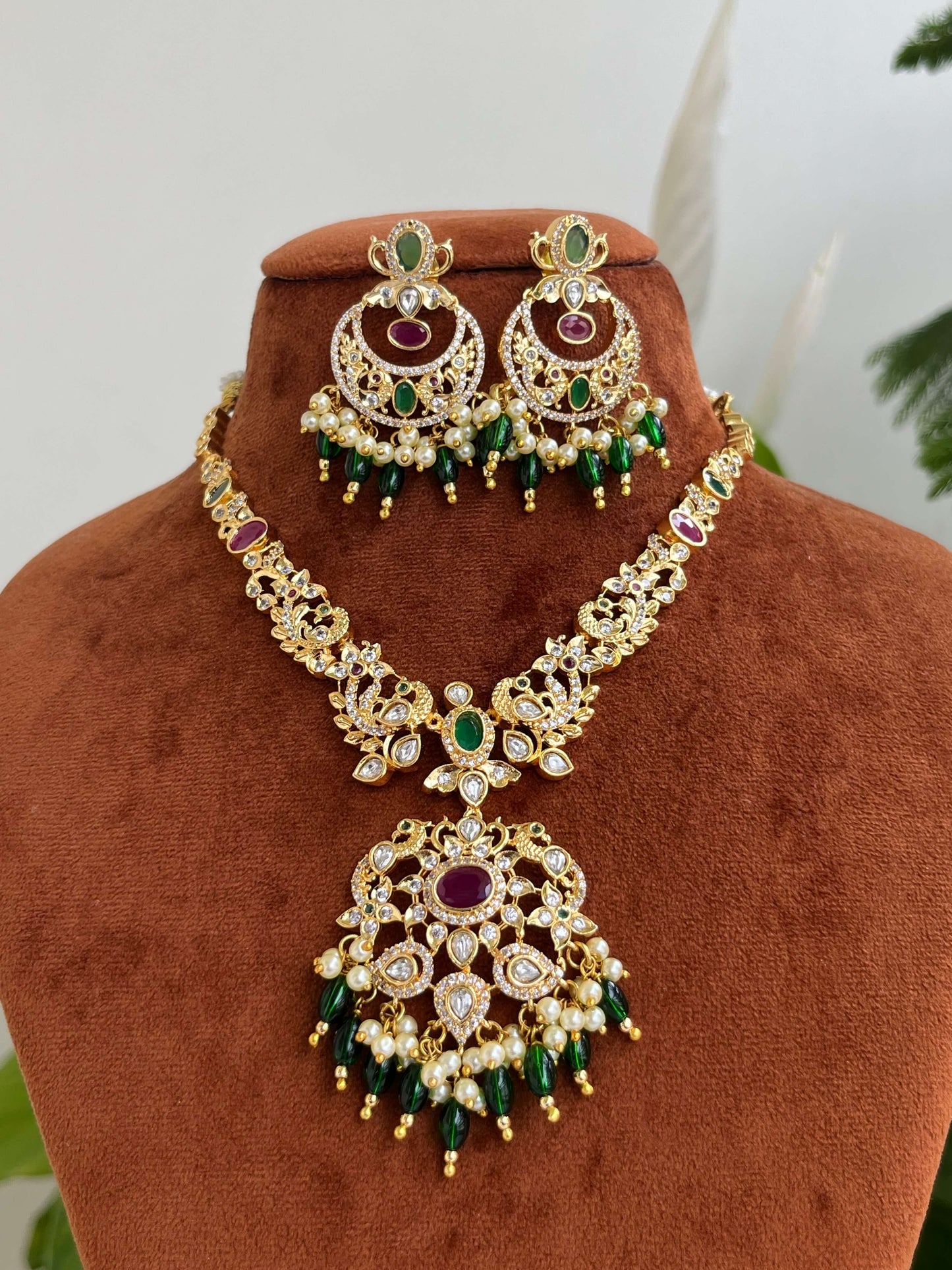 Golden Polish Traditional Necklace with Matching Chaandbali – Green & Ruby Stones, Peacock Motifs