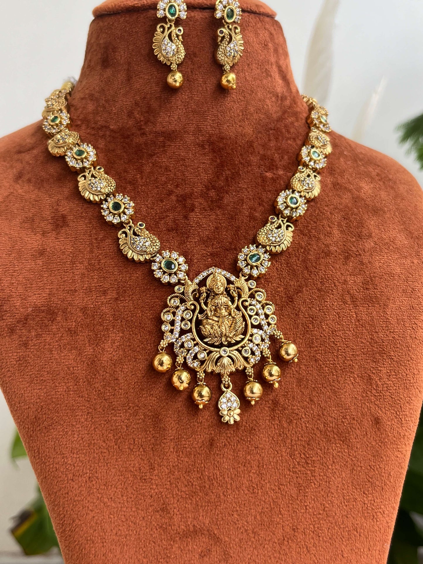 Lakshmi Devi Peacock Motif Necklace with CZ & Emerald Green Stones